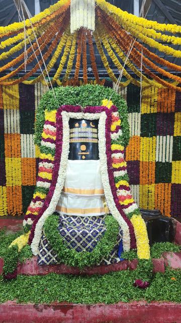 Shivalingam in a flower mandapam